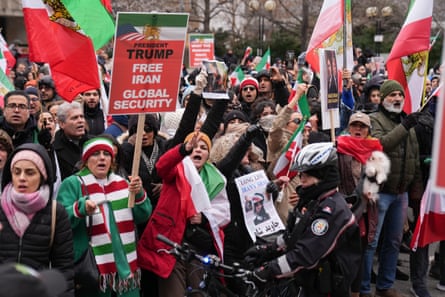 Iranian people attend a rally in Toronto in solidarity with protesters in Iran on 13 January.