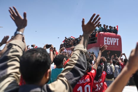 Egyptian fans celebrate and welcome the Egyptian national soccer team.