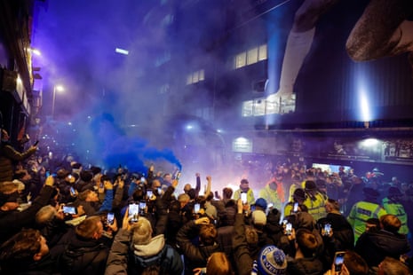 Everton fans on Goodison Road welcome the team bus carrying the players to the ground for the final Merseyside derby at Goodison Park