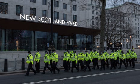 Met police officers outside New Scotland Yard, London, March 2021.