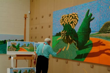 Hockney painting May Blossom on the Roman Road, 2009Stretching across eight canvases, this lush panorama shows blooming hawthorn bushes near the village of Kilham in the East Riding of Yorkshire. He is now settling into his new environment, clearly finding Yorkshire an endless source of inspiration, taking liberties with colour, in this work using them in ways that aren’t always natural.