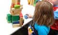 Children play with toys at a preschool in Canberra