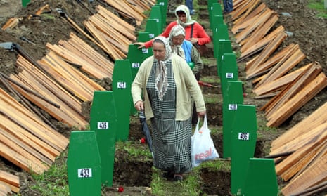 Women at the Potocari Memorial Centre during the burial of 534 Muslims killed by Bosnian Serb forces in Srebrenica.