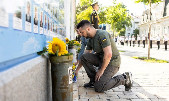 Ukraine's President Volodymyr Zelenskiy and his wife Olena lay flowers at the Memory Wall of Fallen Defenders of Ukraine.