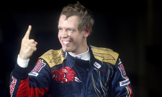 Sebastian Vettel points to indicate number one status after a victory
