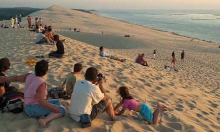 Tourists on the Dune du Pyla at sunset, Arcachon, France