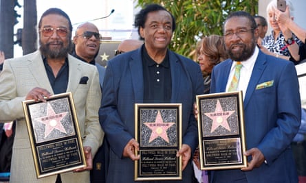 Lamont Dozier, centre, with Eddie Holland and Brian Holland receiving a star on the Hollywood Walk of Fame in Los Angeles, 2015.