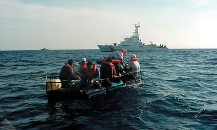 The Coast Guard cutter Key Largo intercepted eight Cuban migrants 25 miles off Cuba. The migrants were drifting in a raft made of 55-gallon drums.