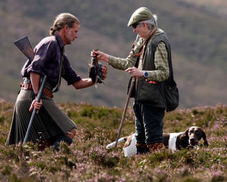 Barclay Dougall and Sue Irvine with German Pointer Ilsa join members of a shooting party out in the hills of the Angus Glens on the opening day of the grouse shooting season.