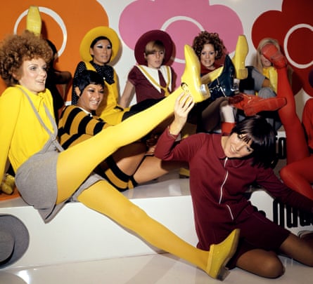 Mary Quant and models in her shoes and tights