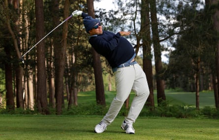Kevin Holland, a 41-year-old golfer with cerebral palsy from Michigan, tees off at the 11th hole