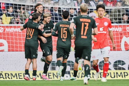 Niclas Füllkrug (third left) celebrates after scoring his side’s second against Mainz.