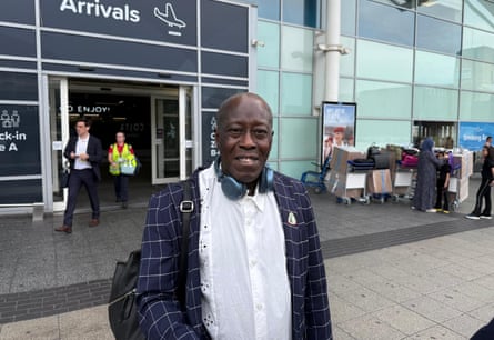 George Lee stood outside an airport