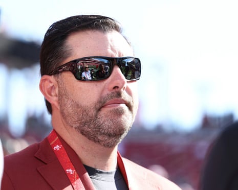 Jed York is pictured on the sidelines of a game.
