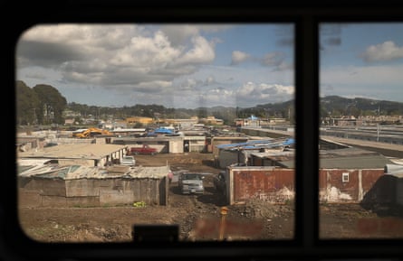 Residential properties and the Chevron refinery in Richmond, as seen through the window of Amtrak’s California Zephyr passenger train.