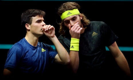 Stefanos Tsitsipas (with headband) and his younger brother Petros in their doubles match in Rotterdam in March 2021.