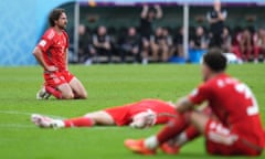 Joe Allen reacts after Iran's first goal in Friday’s Group B game.