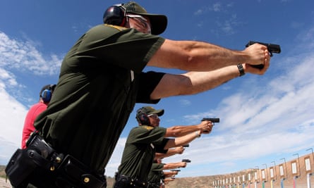 US border patrol trainees on the firing range ... an influx of war veterans has brought a military ethos to the policing job.