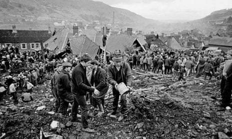 Local men and the emergency services dig through the mud for survivors at The Pantglas Junior School, Aberfan on 21st October 1966.