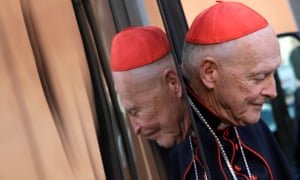 Man in the mirror: Cardinal McCarrick arrives for a meeting at the Synod Hall in the Vatican in 2013.