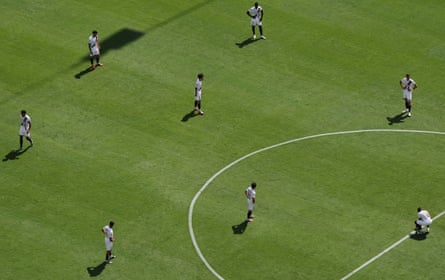 PSG players look around for answers after they go 2-0 down.
