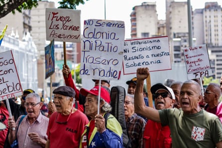 Protesters holding placards