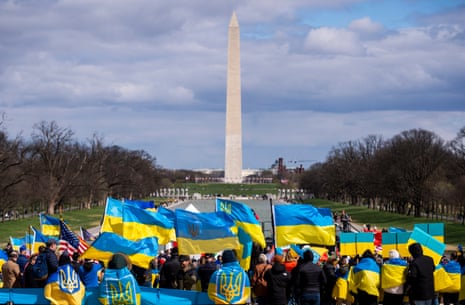People participate in a pro-Ukraine rally at the Lincoln Memorial in Washington, DC.