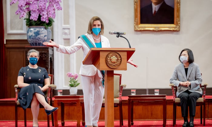 Pelosi speaks at the presidential office in Taipei.