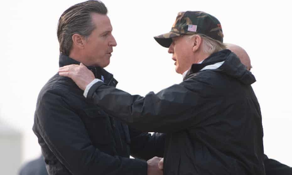 Donald Trump greets Gavin Newsom at Beale air force base in California while traveling to view wildfire damage in November. 