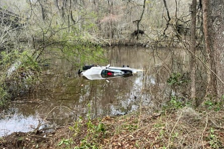 A submerged car in Georgia’s Brier Creek, where a woman and her two children were rescued by five members of a sorority.
