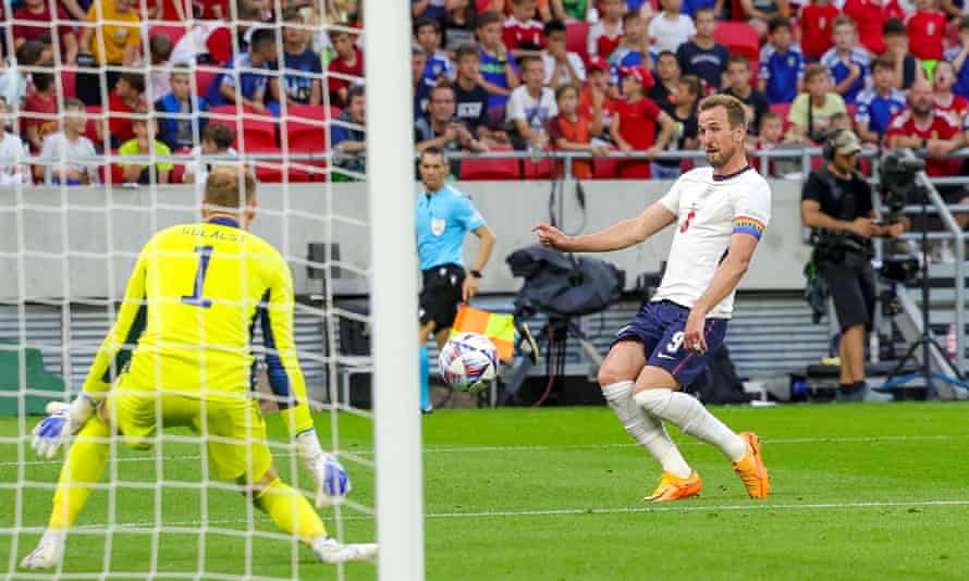 Harry Kane of England shoots towards the goal.
