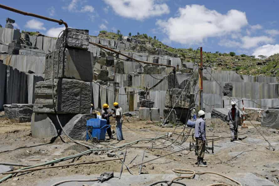 Workers at a black granite site in Mutoko.