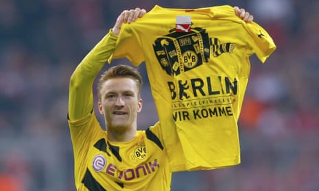 Marco Reus celebrates after defeating Bayern Munich in the German Cup semi-final match in 2015