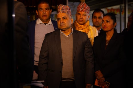 Keshav Kadel , centre, with other members of the Nepali community in Melbourne.