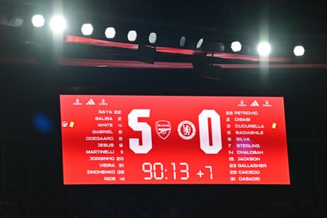 The big screen scoreboard displays the final 5-0 scoreline.