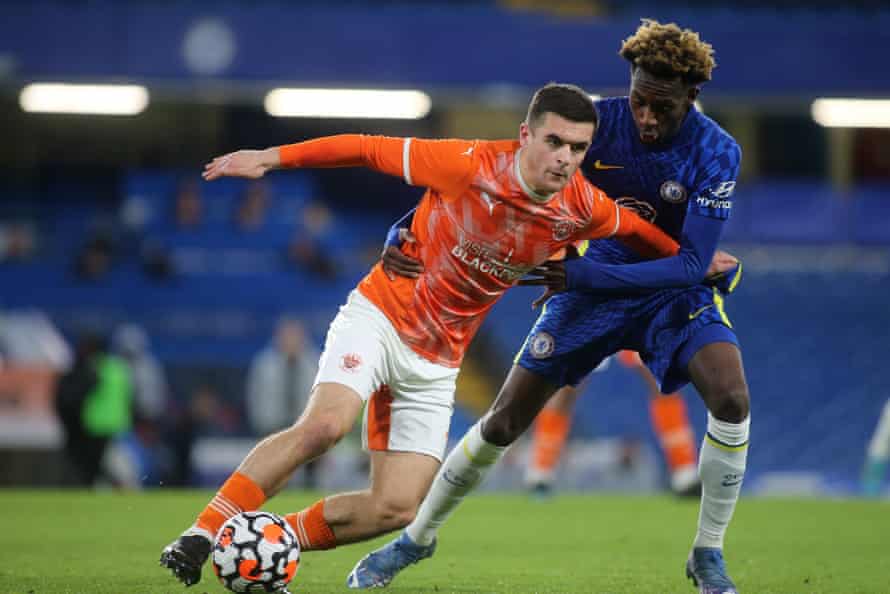 Jake Daniels, playing for Blackpool Under-18s in February, shields the ball from Chelsea’s Luke Bailey Badley-Morgan.