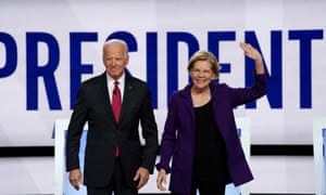 Joe Biden andElizabeth Warren pose together in October