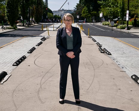 a woman stands outside on street in washington dc
