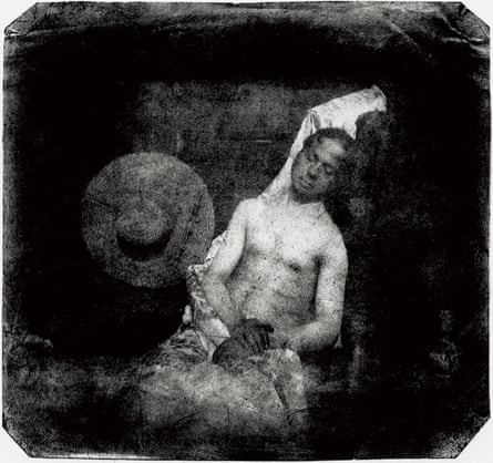 Staged black and white image of a man who has drowned himself