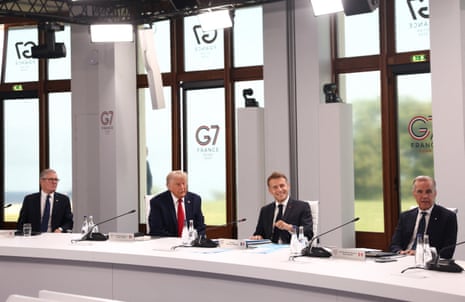 The leaders sit at a table