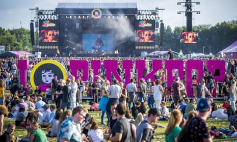 Festival goers gather during the first day of the music festival Pinkpop, at Landgraaf. A bus struck four people in the early hours of Monday, killing one and injuring three, police said.