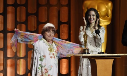 Agnes Varda accepted an honorary Oscar in 2017 as presenter Angelina Jolie looked on.