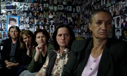 Bosnian Muslim women from Srebrenica watch a televised broadcast of former Bosnian Serb military chief Ratko Mladic’s court proceedings at The Hague