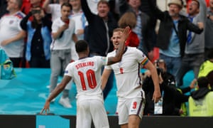 Raheem Sterling and Harry Kane celebrate after the captain scored England's second