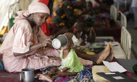 A mother feeds her malnourished child at clinic run by Médecins Sans Frontières in Maiduguri.