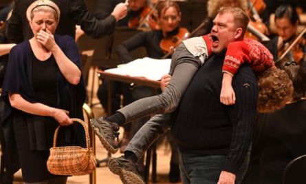 Genuine music drama … Erin Wall as Ellen Orford and Stuart Skelton as Peter Grimes (carrying Samuel Winter as boy apprentice) with the Bergen Philharmonic Orchestra in Peter Grimes, semi-staged at the Royal Festival Hall, London.