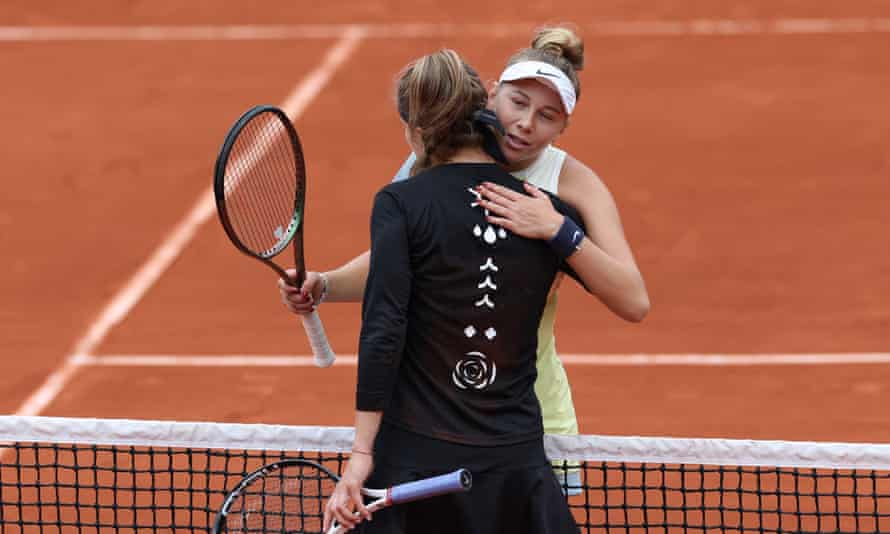 Amanda Anisimova consoles Karolina Muchova after she was forced to retire in the third set.