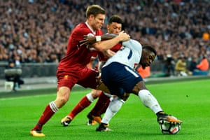 Liverpool’s James Milner kepps tabs on Tottenham’s Serge Aurier as Spurs win 4-1 at Wembley Stadium.