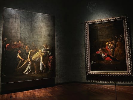 Two paintings, one on left featuring a man holding a body amid a crowd, one on right featuring a Madonna with baby and shepherds.