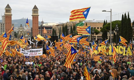 Protesters in Barcelona with pro-Catalan independence flags